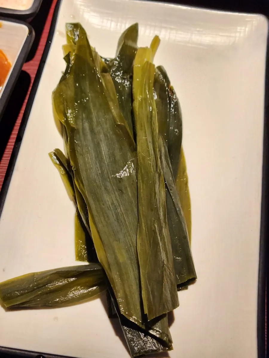 Close-up of side dish plates at Giun Gangnam Station Main Branch
