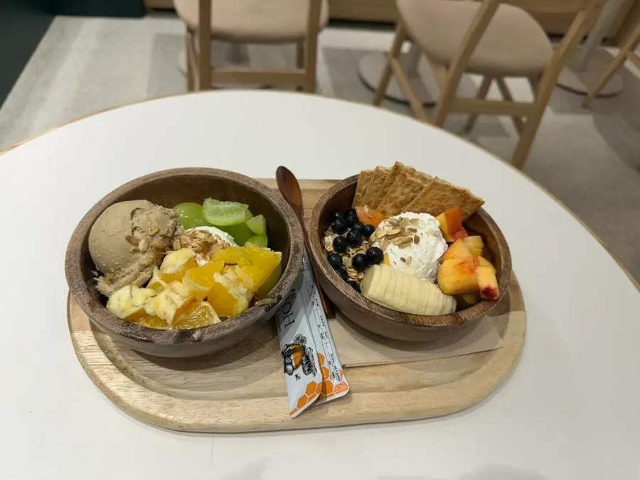 Two Greek yogurt bowls placed on the table