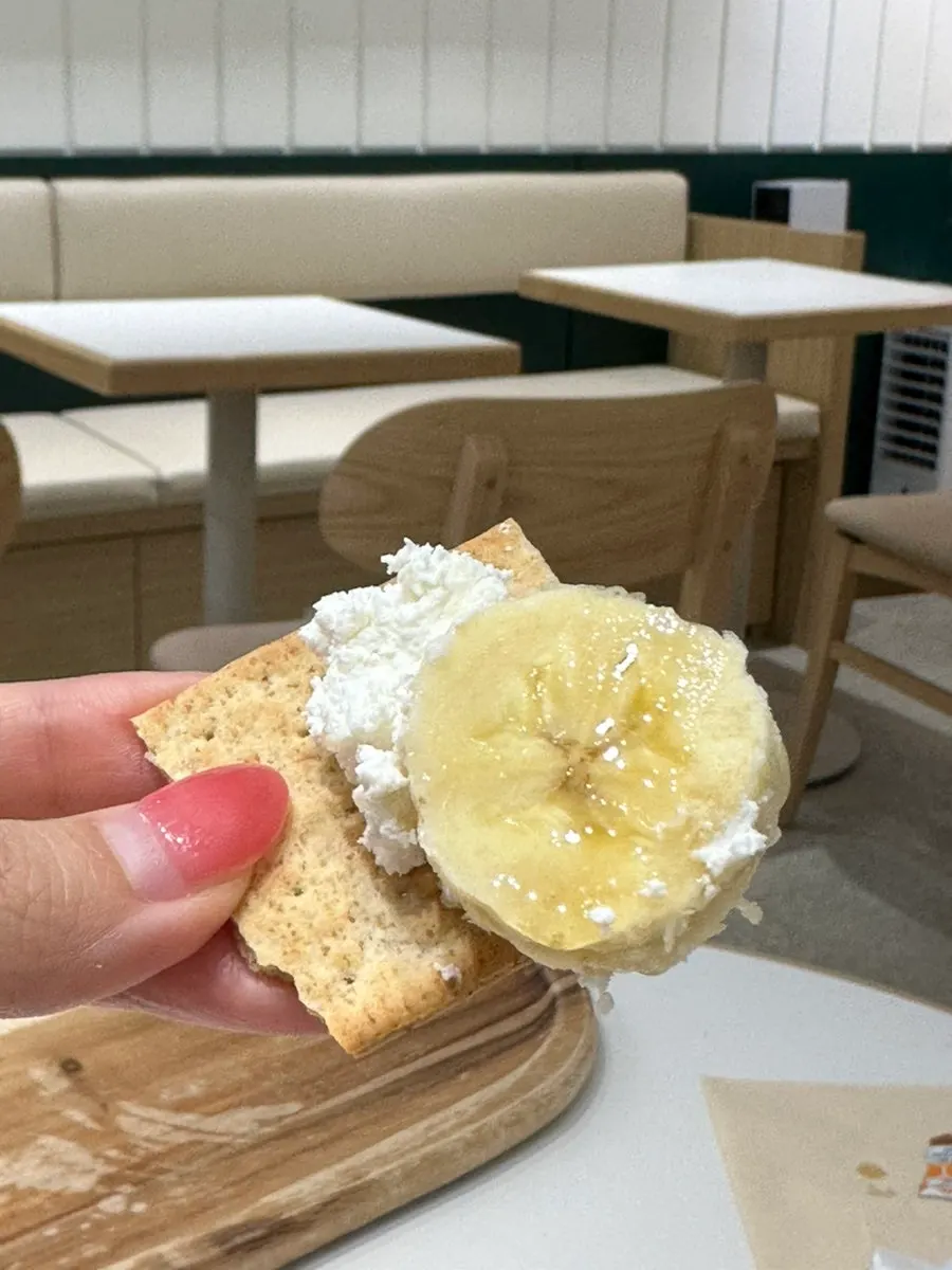 Crackers served alongside the yogurt