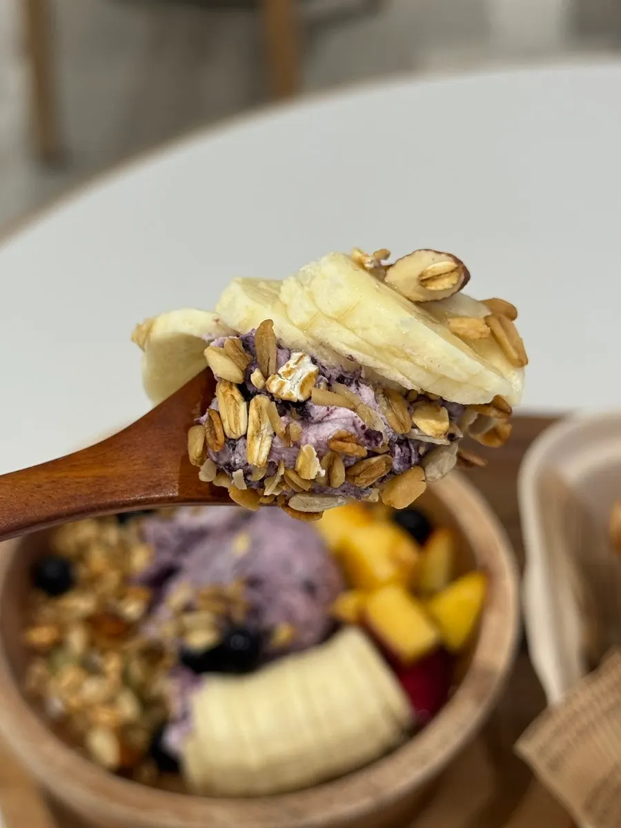 A bite of Beheu Greek yogurt with fruit toppings