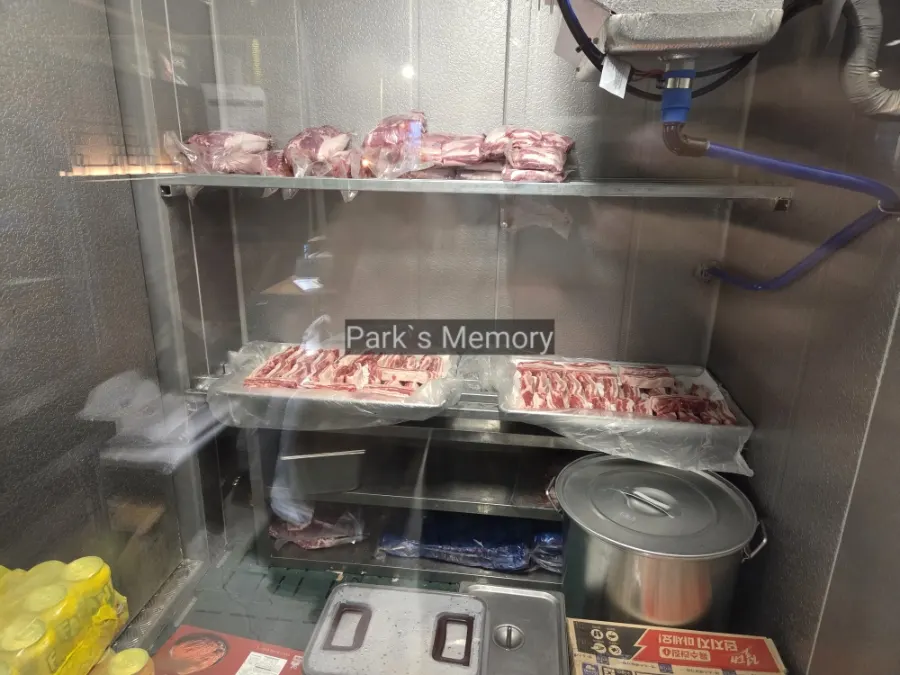 Refrigerated space where meat is aged and stored