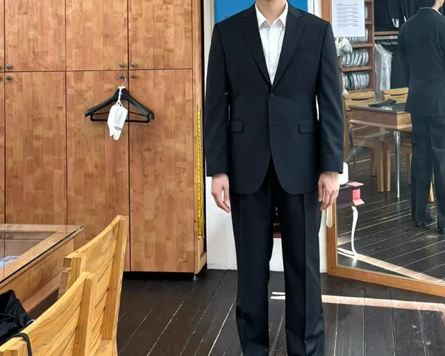Picking up the finished groom's suit