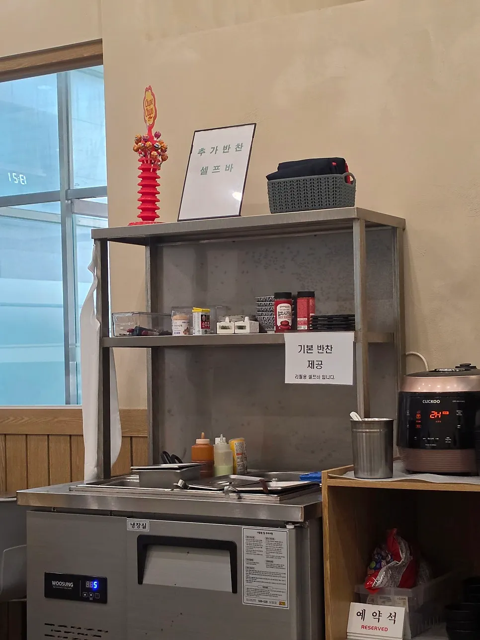 Self bar where diners can refill rice and side dishes