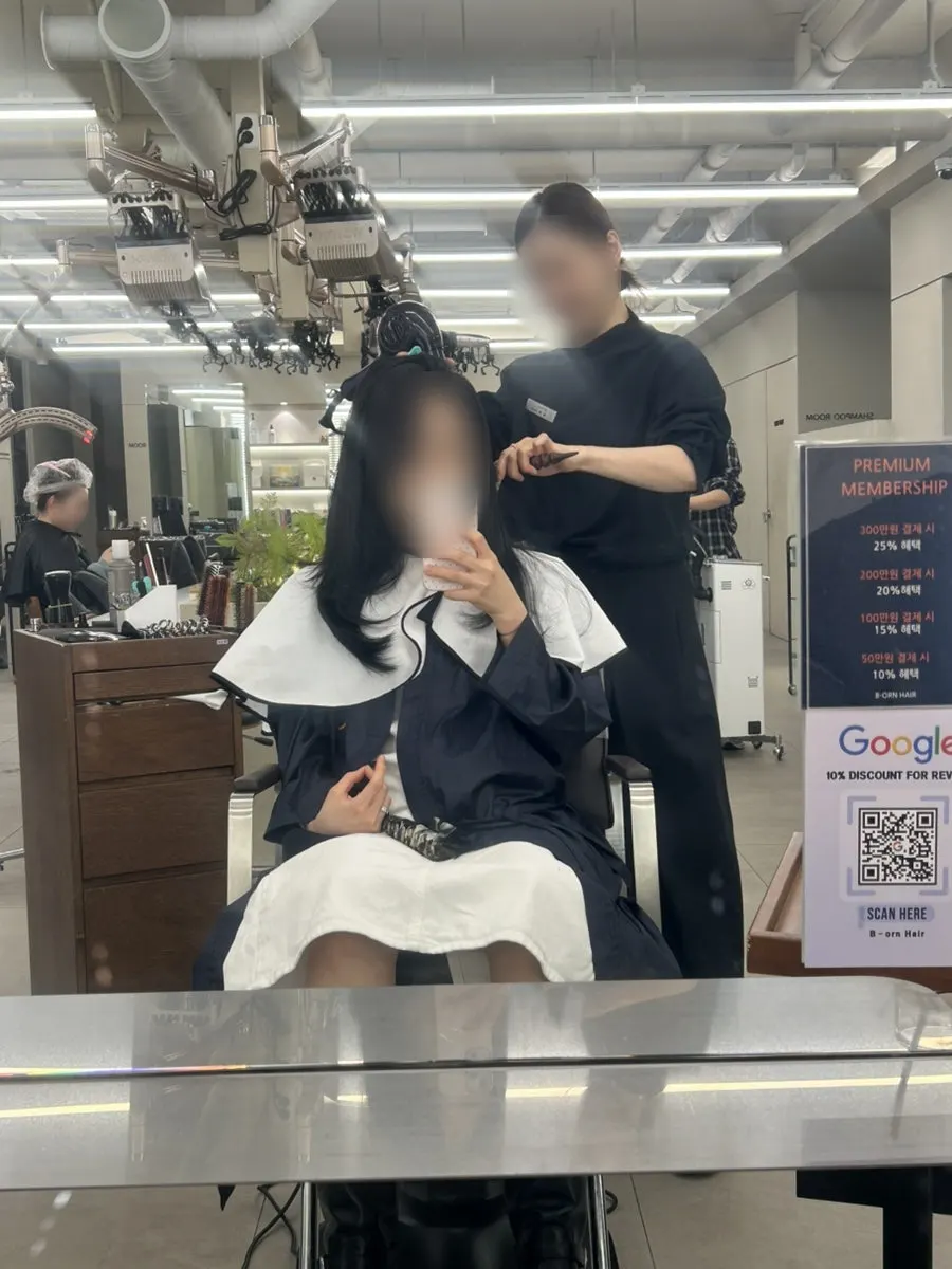 Black hair styled with a blow-dry
