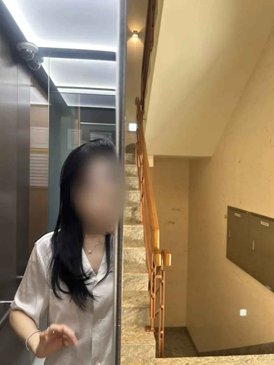Elevator with a mirror in the building