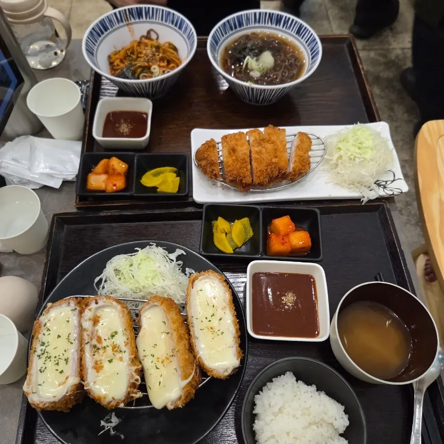 Generously served pork cutlet and buckwheat noodle dishes