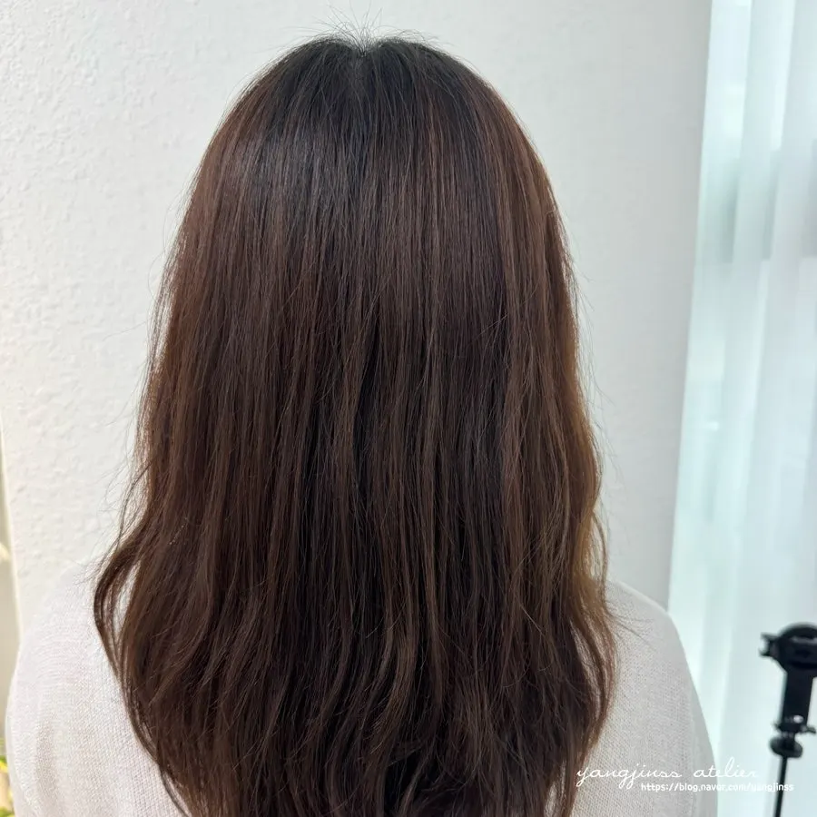 Tone-down dyed hair after blow-drying and styling