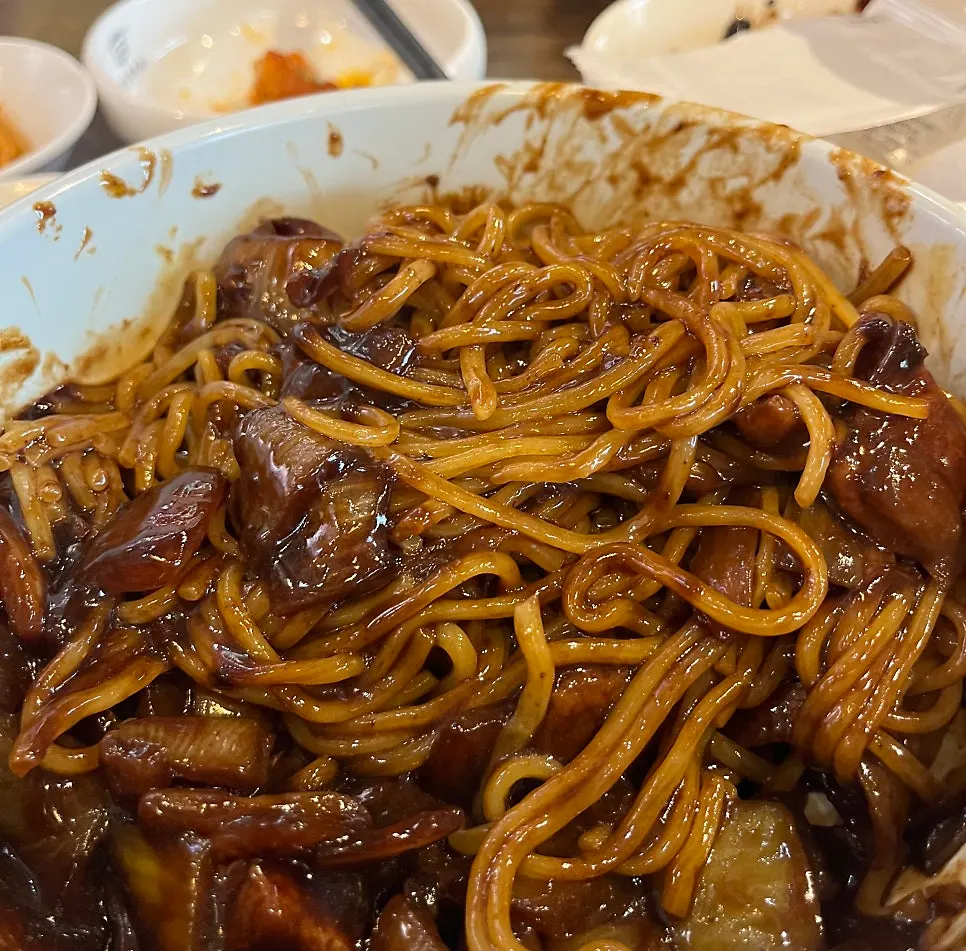 Jajang topped with a softly fried egg