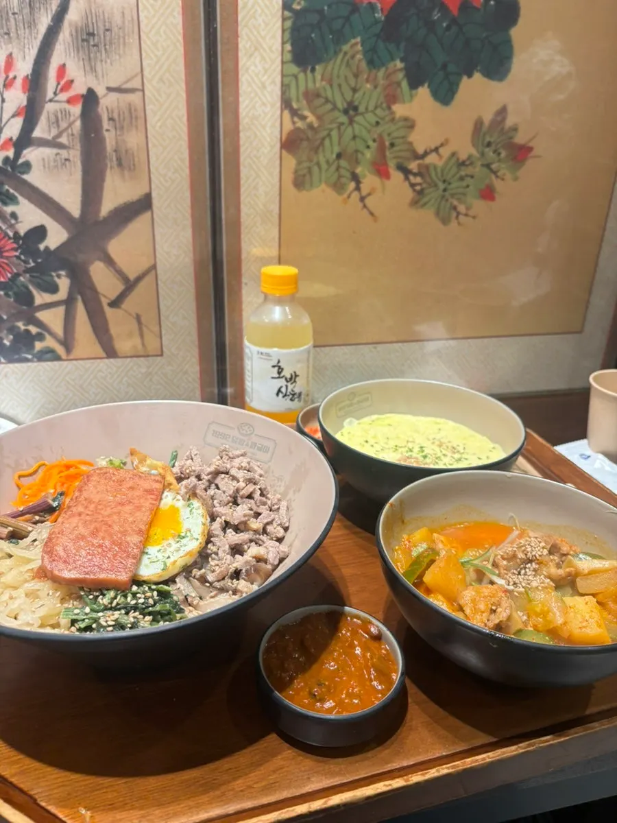 Mixing seafood ssamjang bibimbap