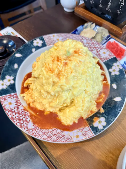 Soft omelet cut open in half