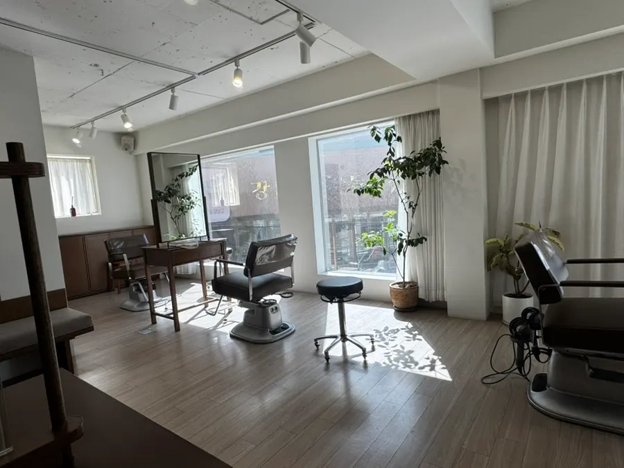 Hair salon interior with sunlight streaming in