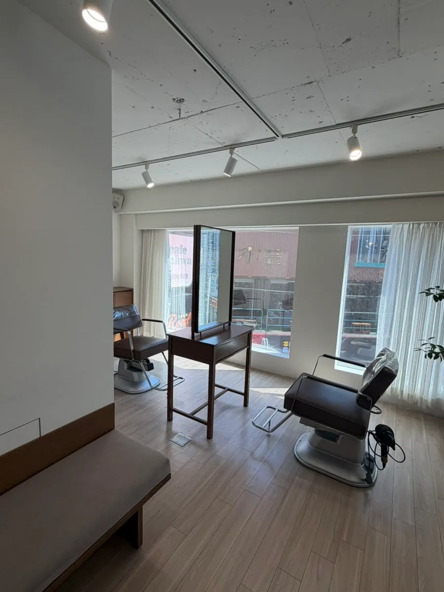 Interior of the salon with wood-tone decor