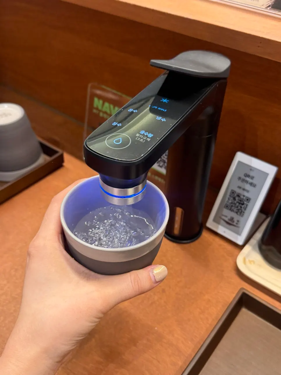 Table QR ordering sign and water dispenser