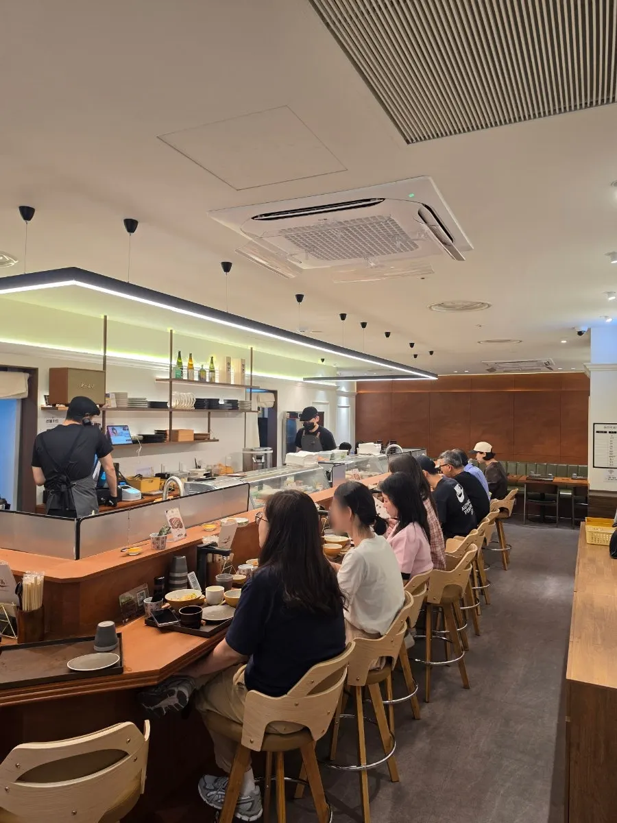 Interior divided into bar-table seats and table seats
