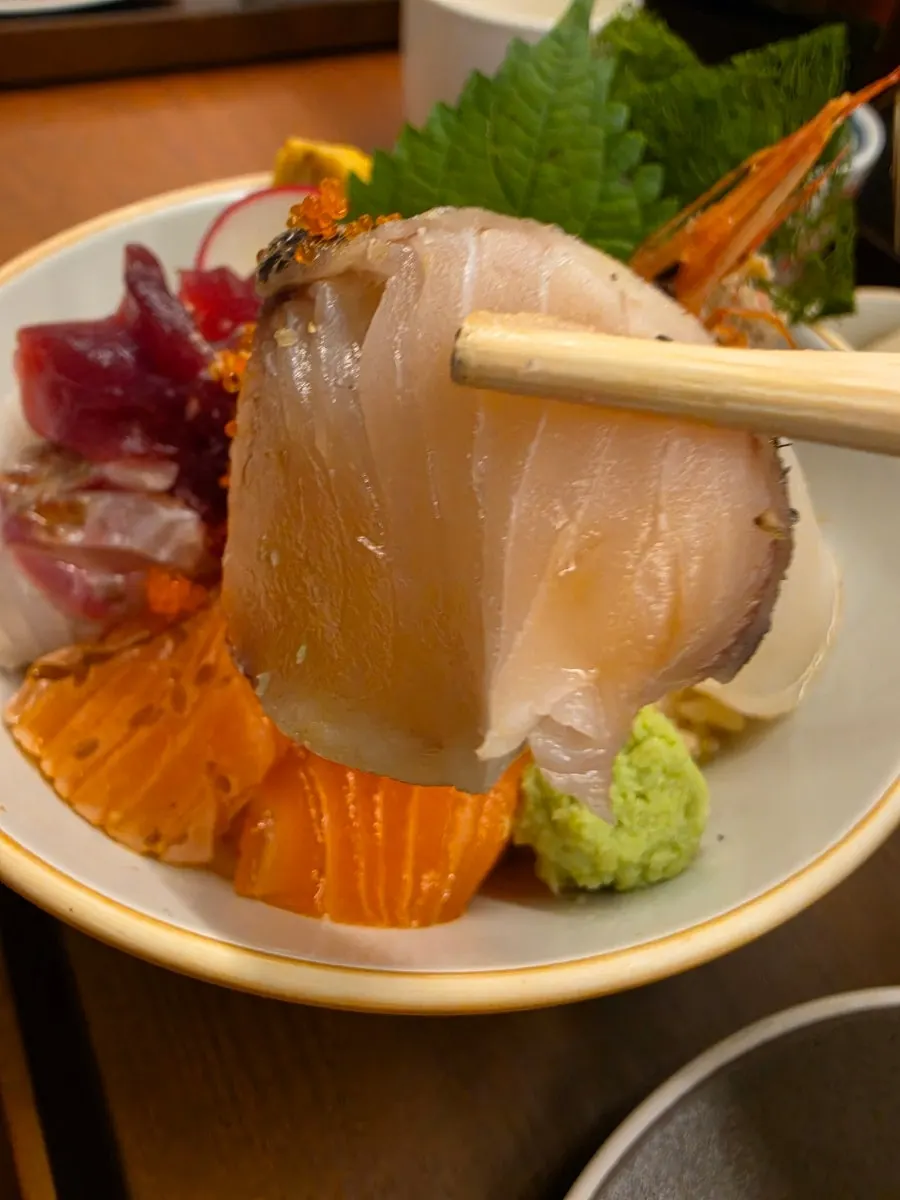 Salmon and mackerel visible in the kaisendon
