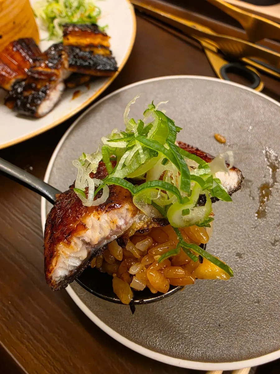 A scoop of the eel and rice together