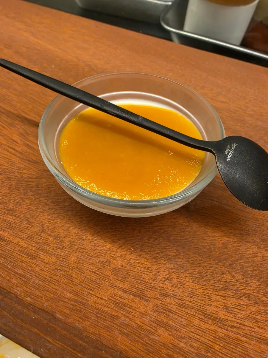 Closing dessert of milk pudding topped with mango mousse
