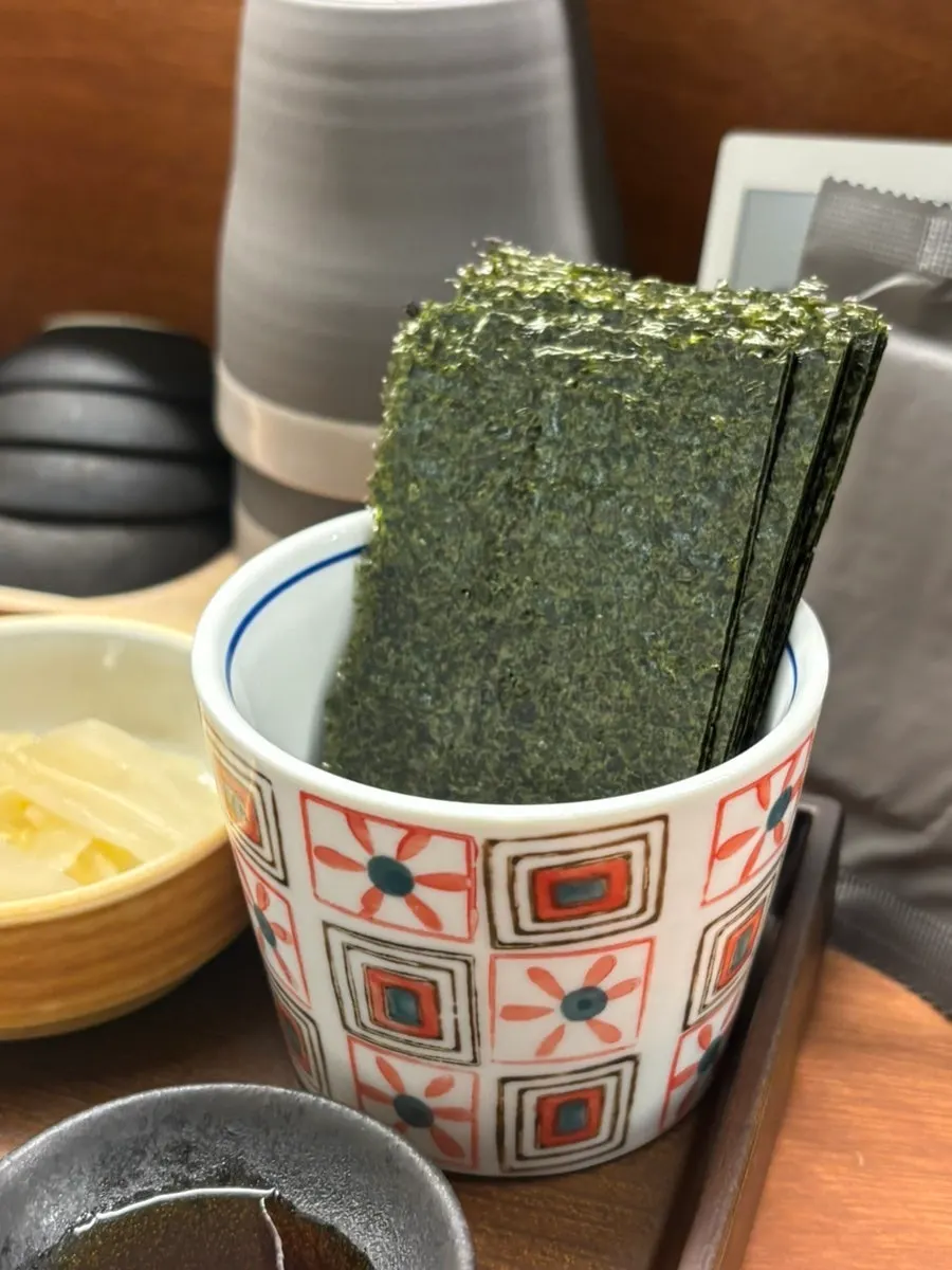 Seaweed and basic table setting served first