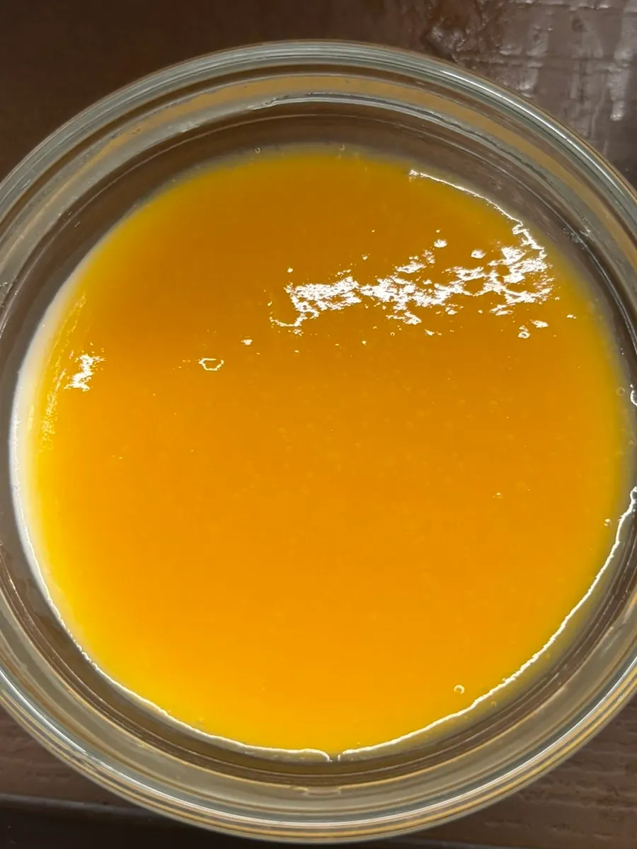 Milk pudding dessert topped with sauce