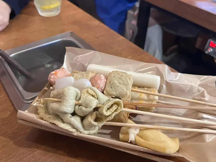 Oden bar table setup with individual broth poured into each seat