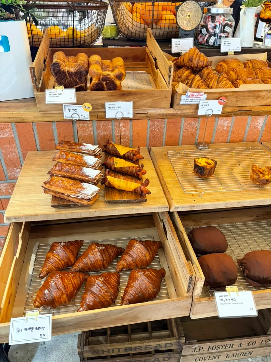Bakery display with madeleines and tarts