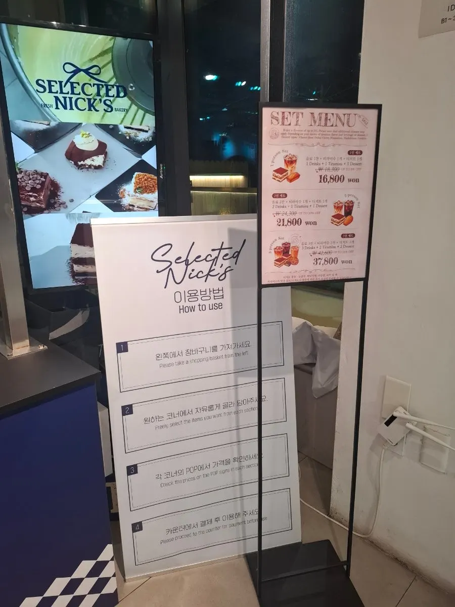 Baked goods case with various pastries on display