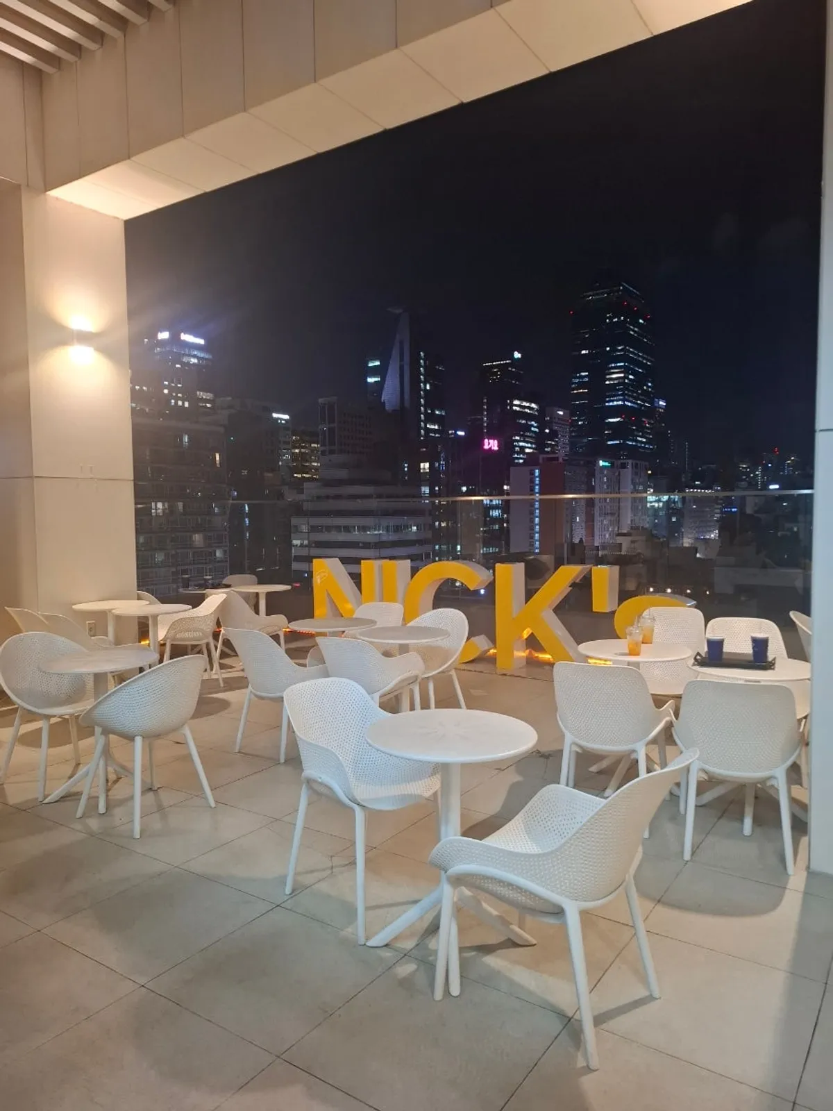Rooftop tables and lighting at Selected Nicks