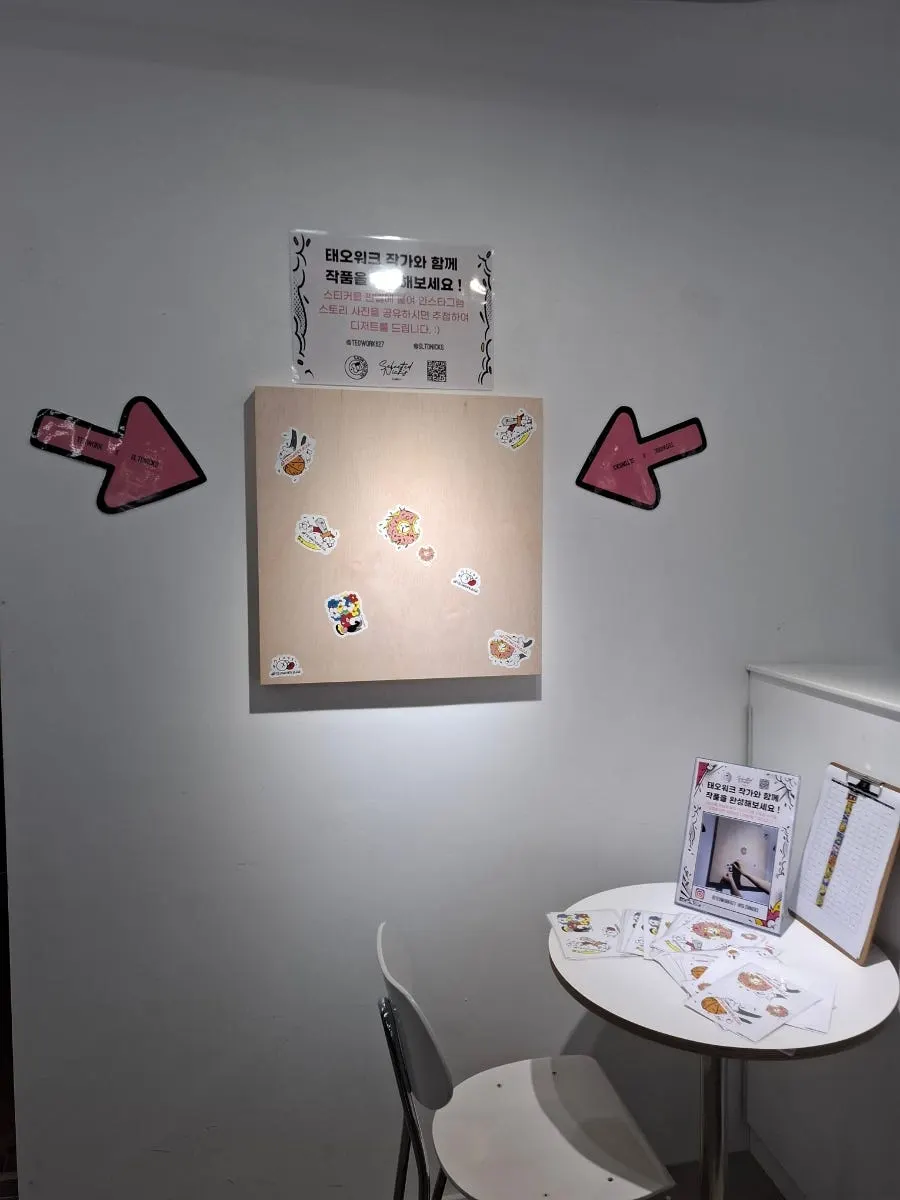 Artwork displayed on a 2nd floor wall