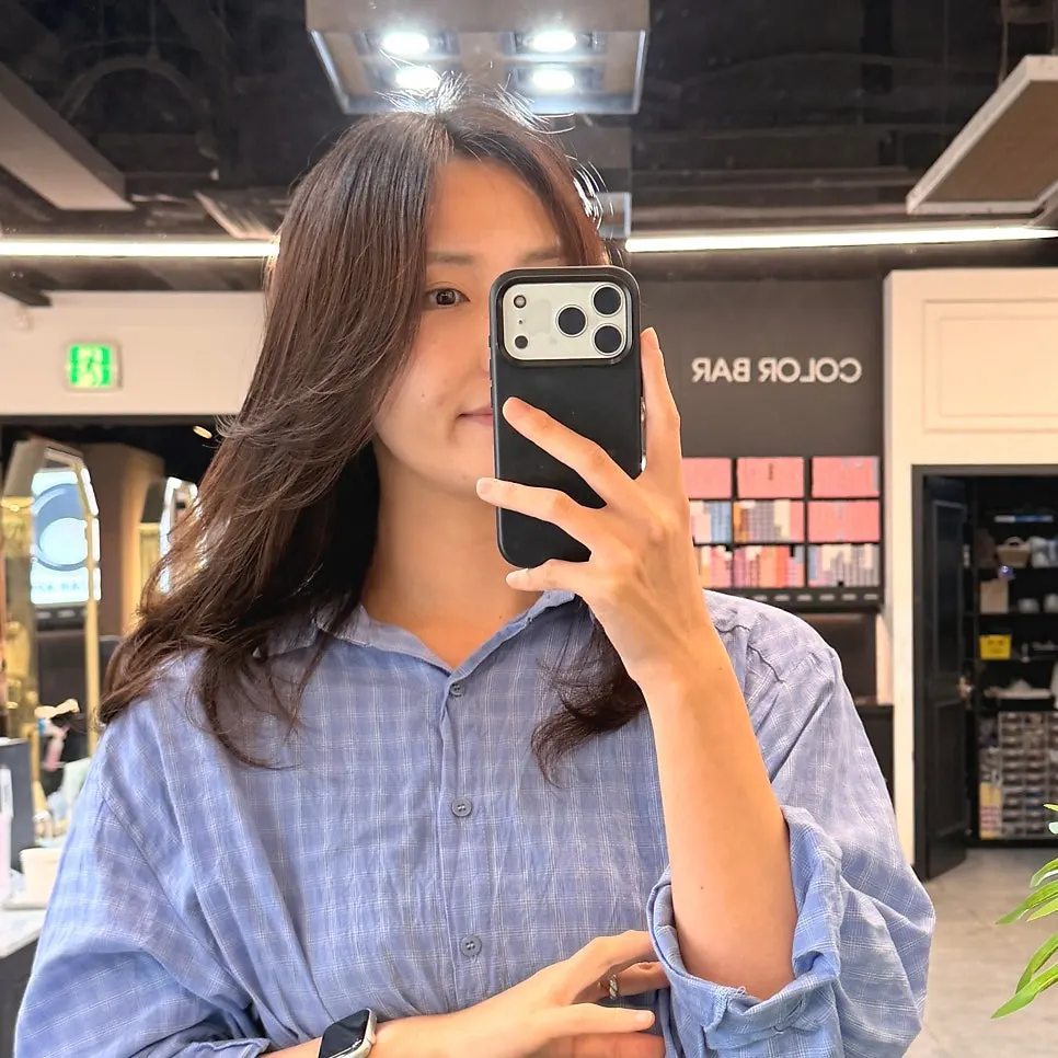 Hair looking dry and frizzy from summer damage before the treatment