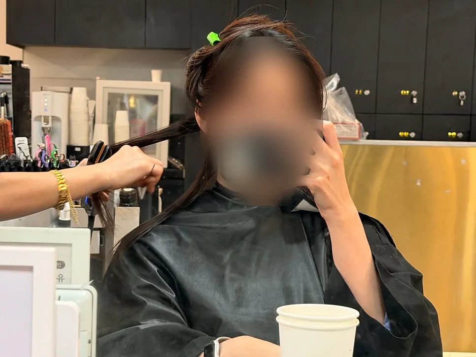 Director Koara beginning the recovery perm treatment
