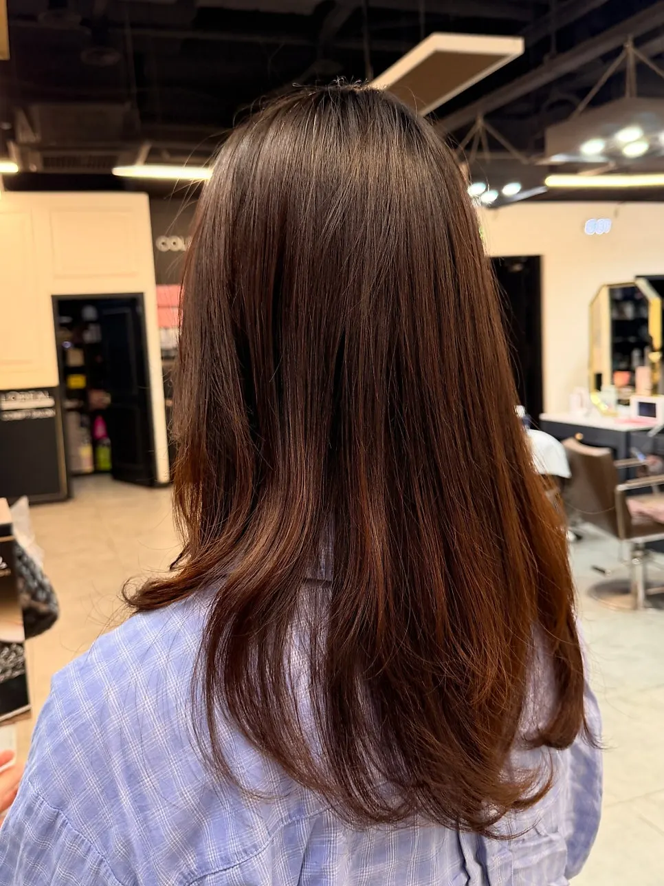 Finished style with volume brought back by end curls