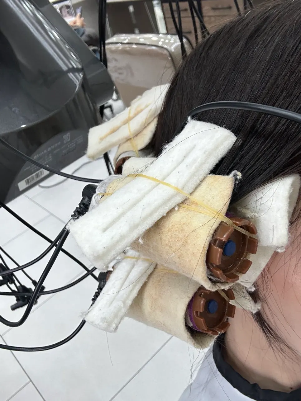 Section-by-section perm process for the desired wave shape
