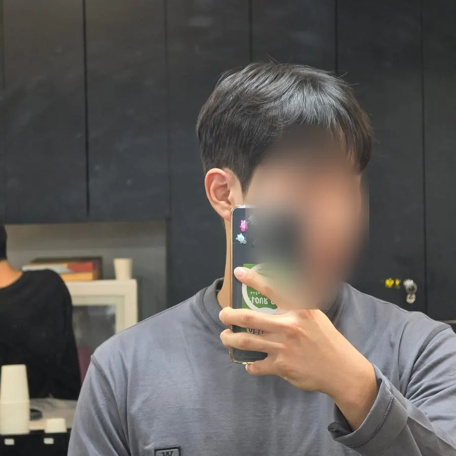 ダウンパーマで整ったサイドヘアのアフター