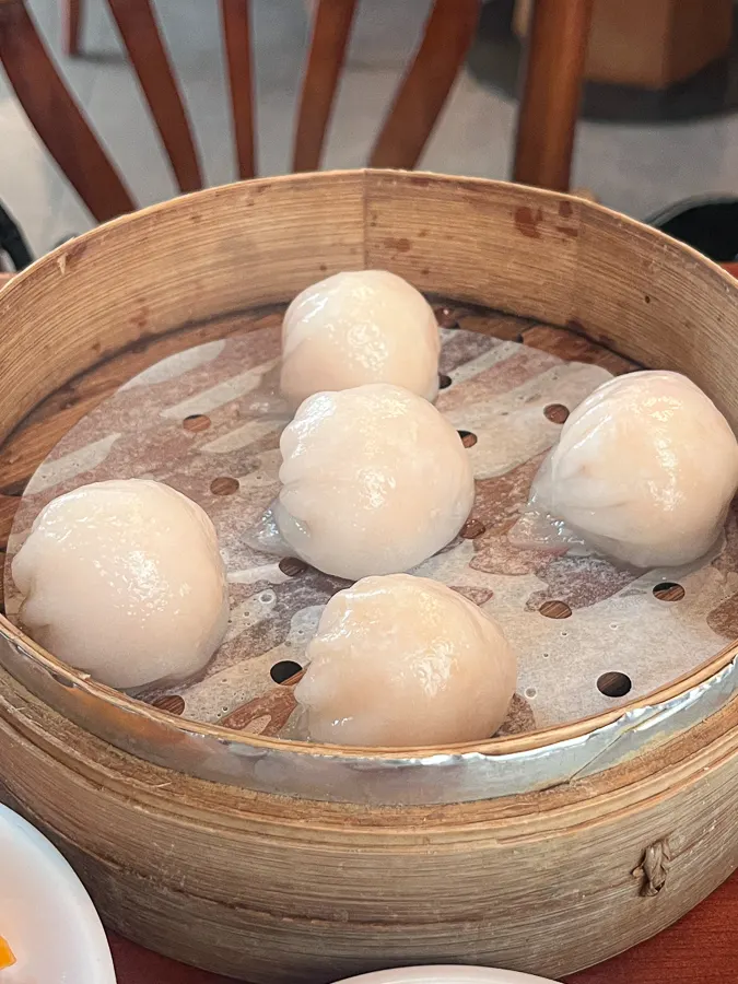 Har gow dim sum served in a steamer