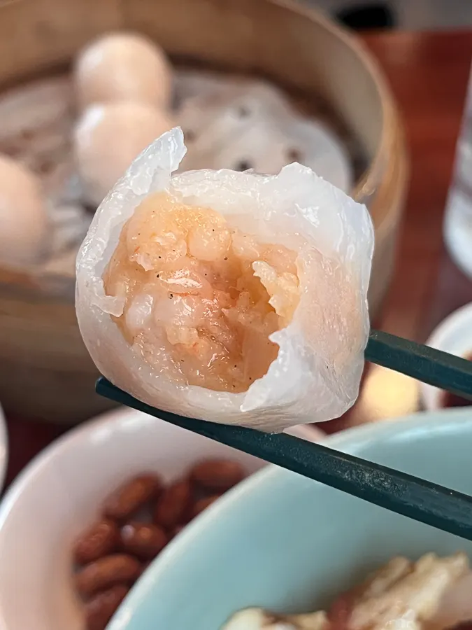 Har gow dim sum split in half showing the filling