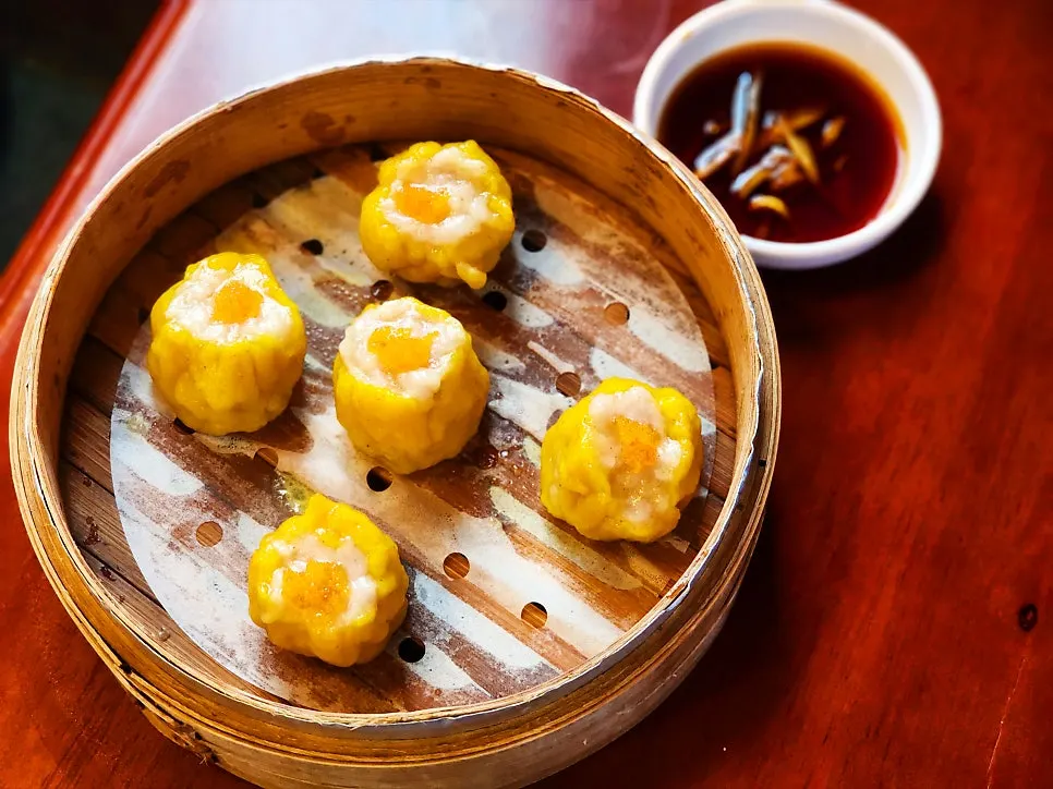 Handmade shaomai dim sum in a steaming steamer