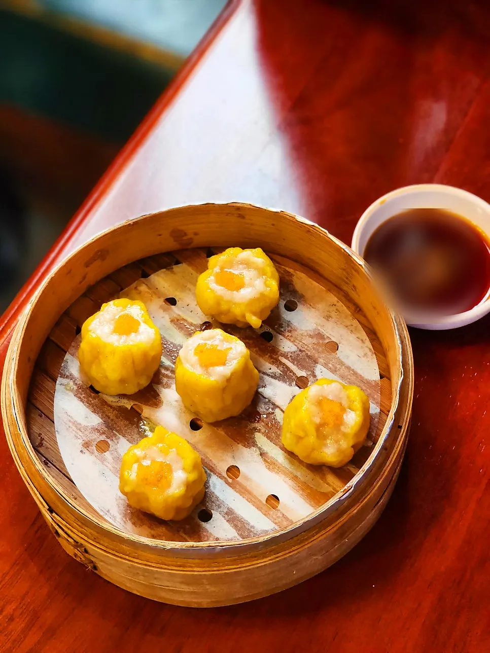 Close-up of round, hand-shaped shaomai