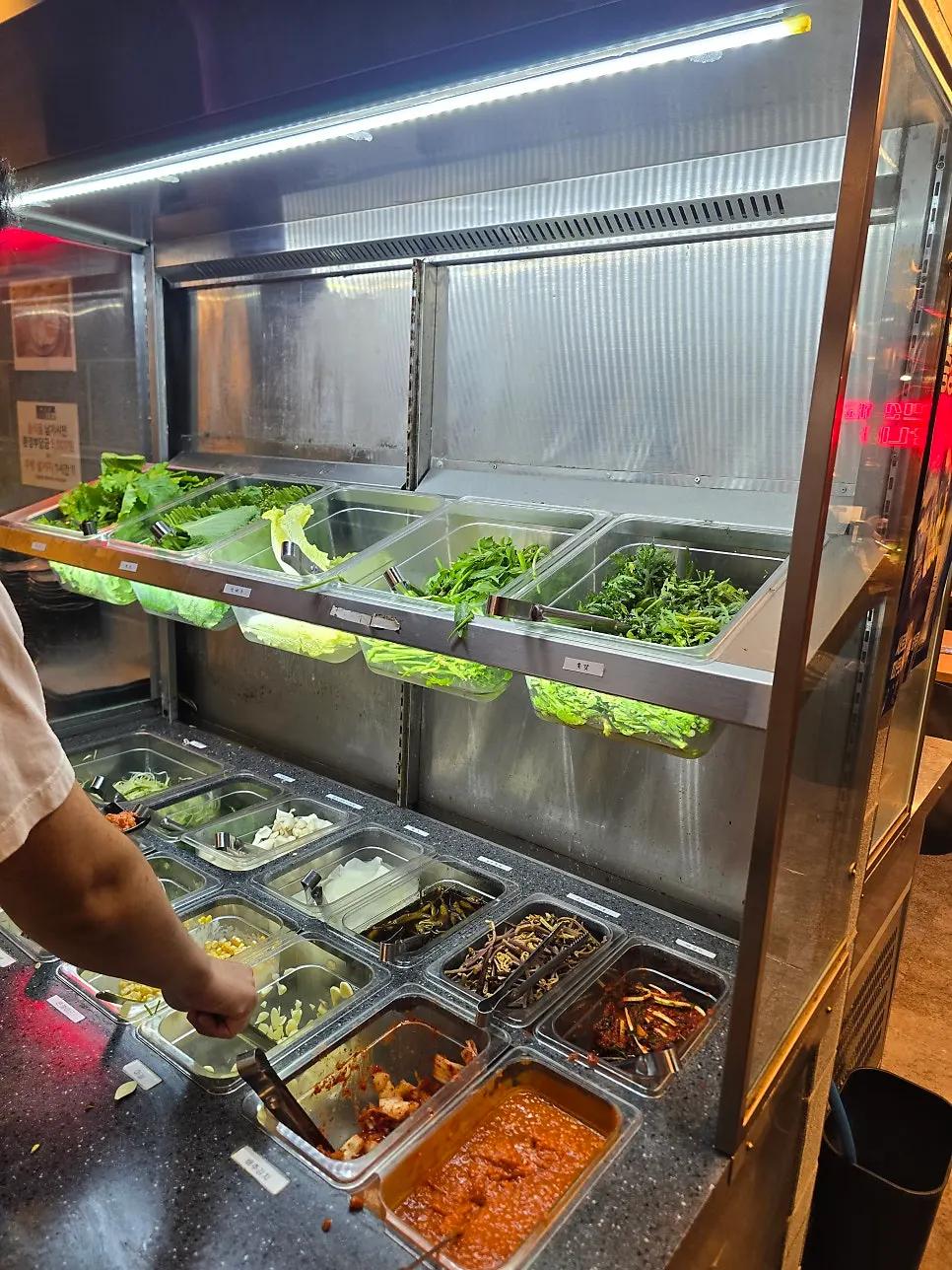 Indoor seating and tables at Daepae Market