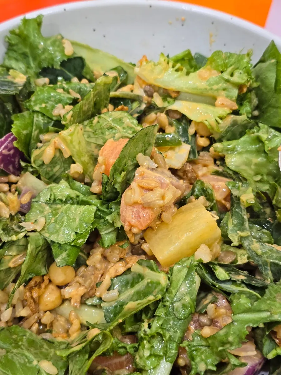 Large chunks of salmon in the poke with an extra scoop added