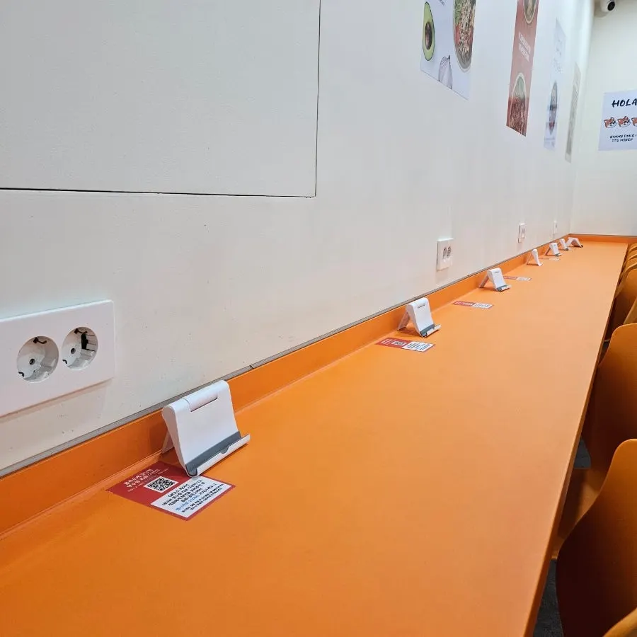 Wall-side bar table with phone stand and outlet