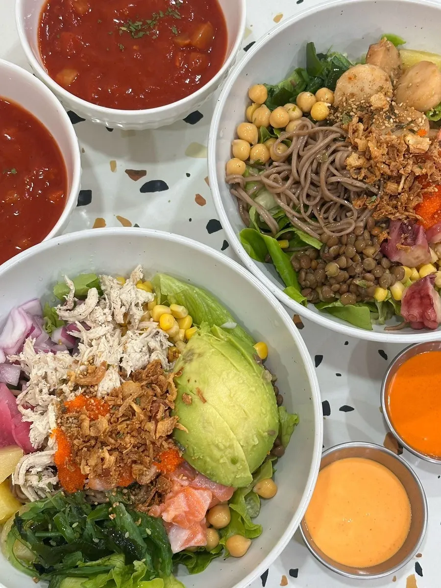 Two bowls set out: Super Protein poke and seafood poke