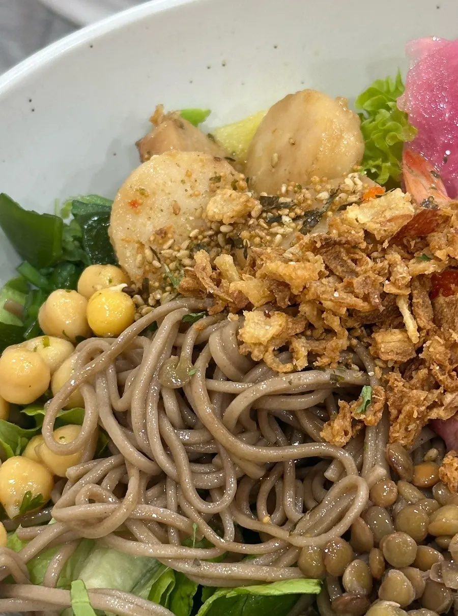 Close-up of the soba noodle base poke