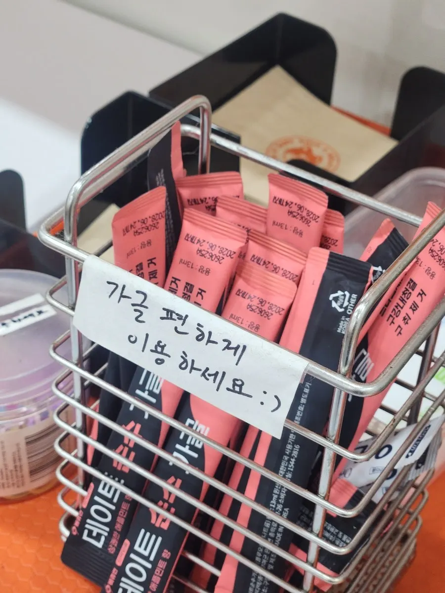 Mouthwash and tableware at the self-serve corner