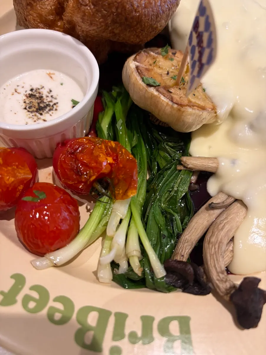 Brivit steak covered in melted cheese