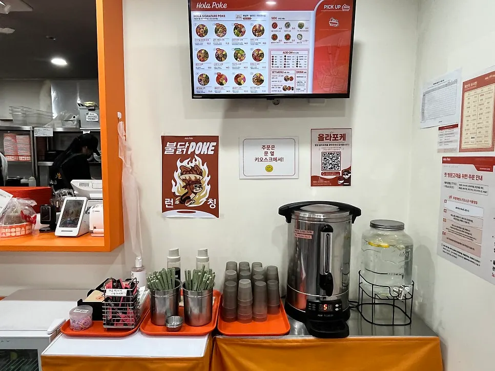 Self-service bar with lemon water and rooibos tea
