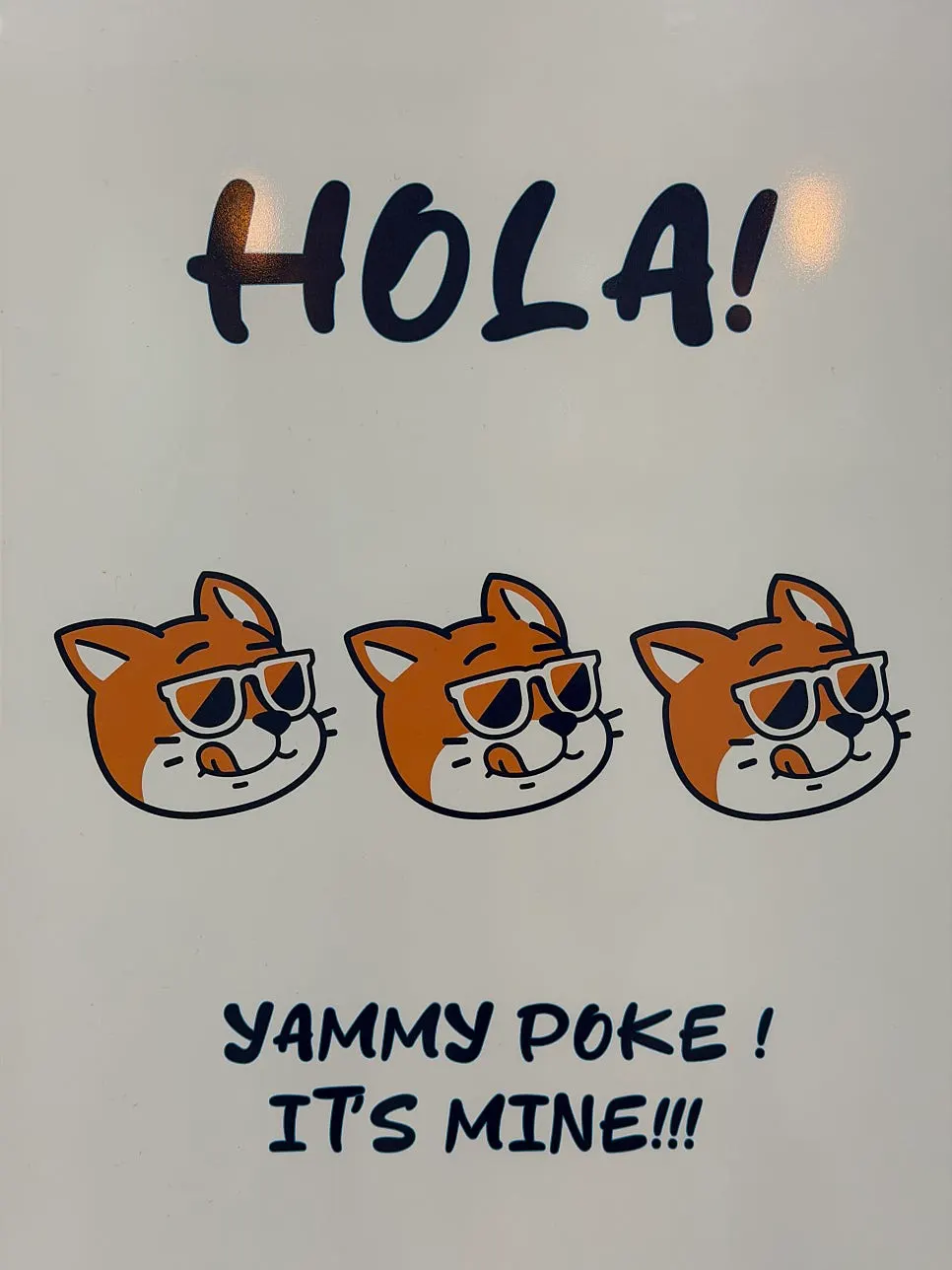 Basement floor sign for Ola Poke