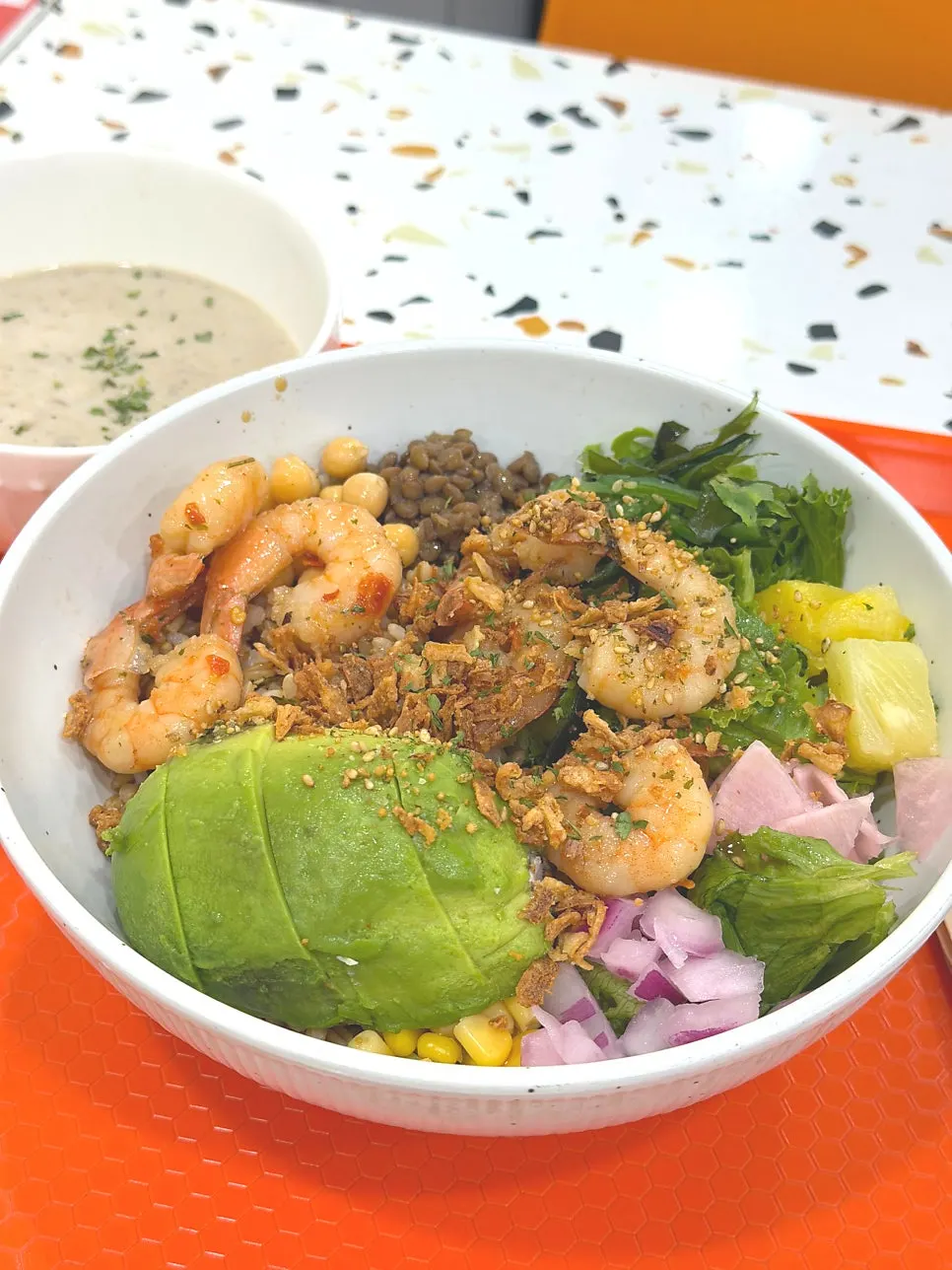 Full spread of the shrimp poke with added avocado