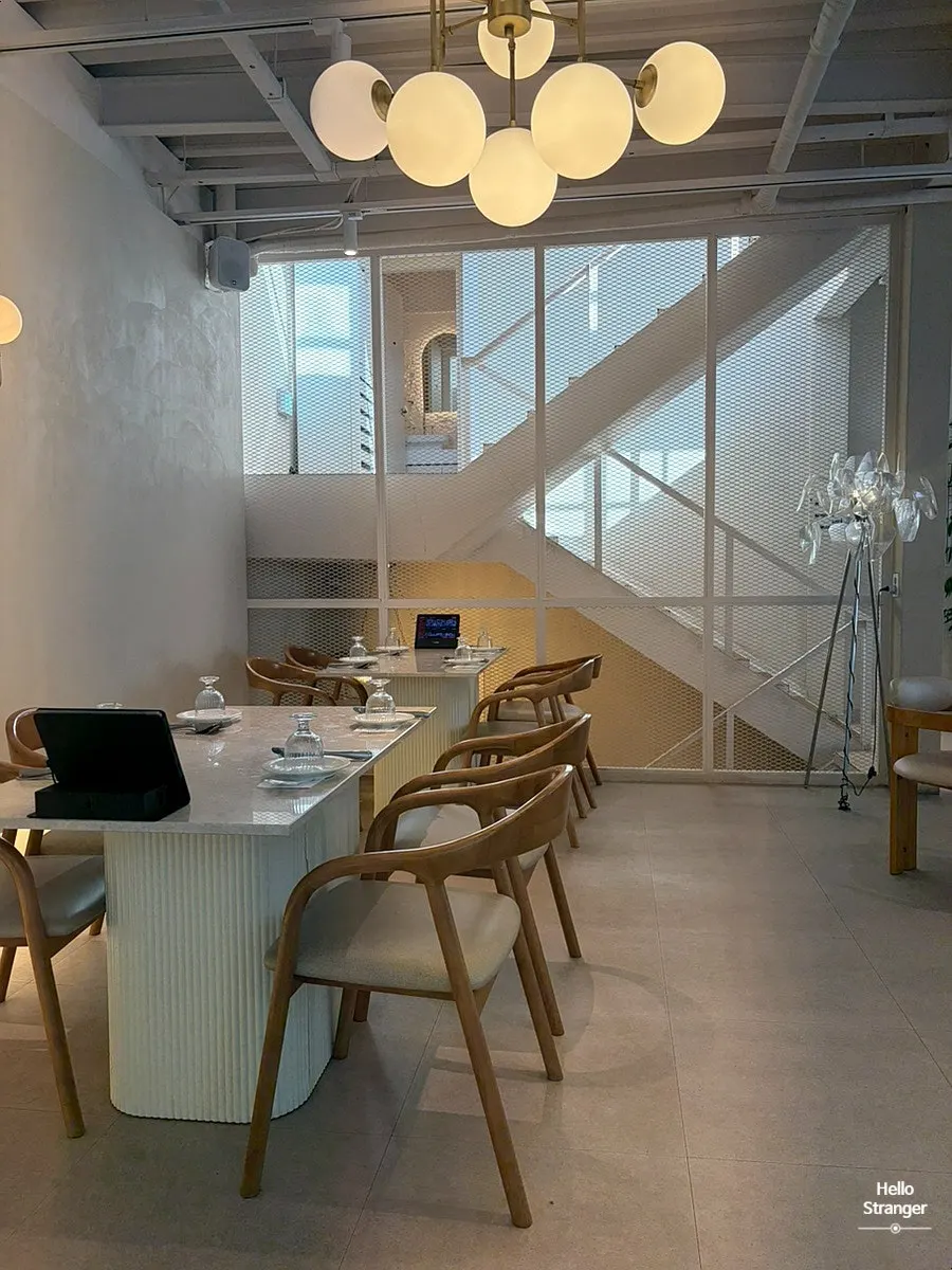 Gathering space with tables for six