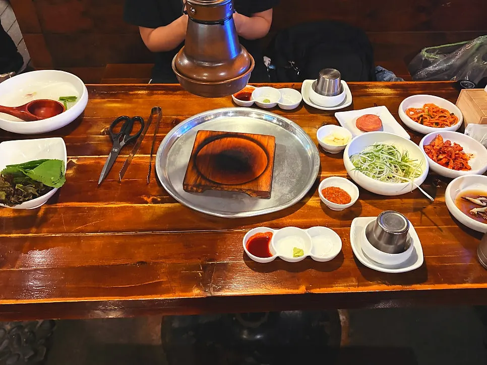 Side dishes including pink sausage