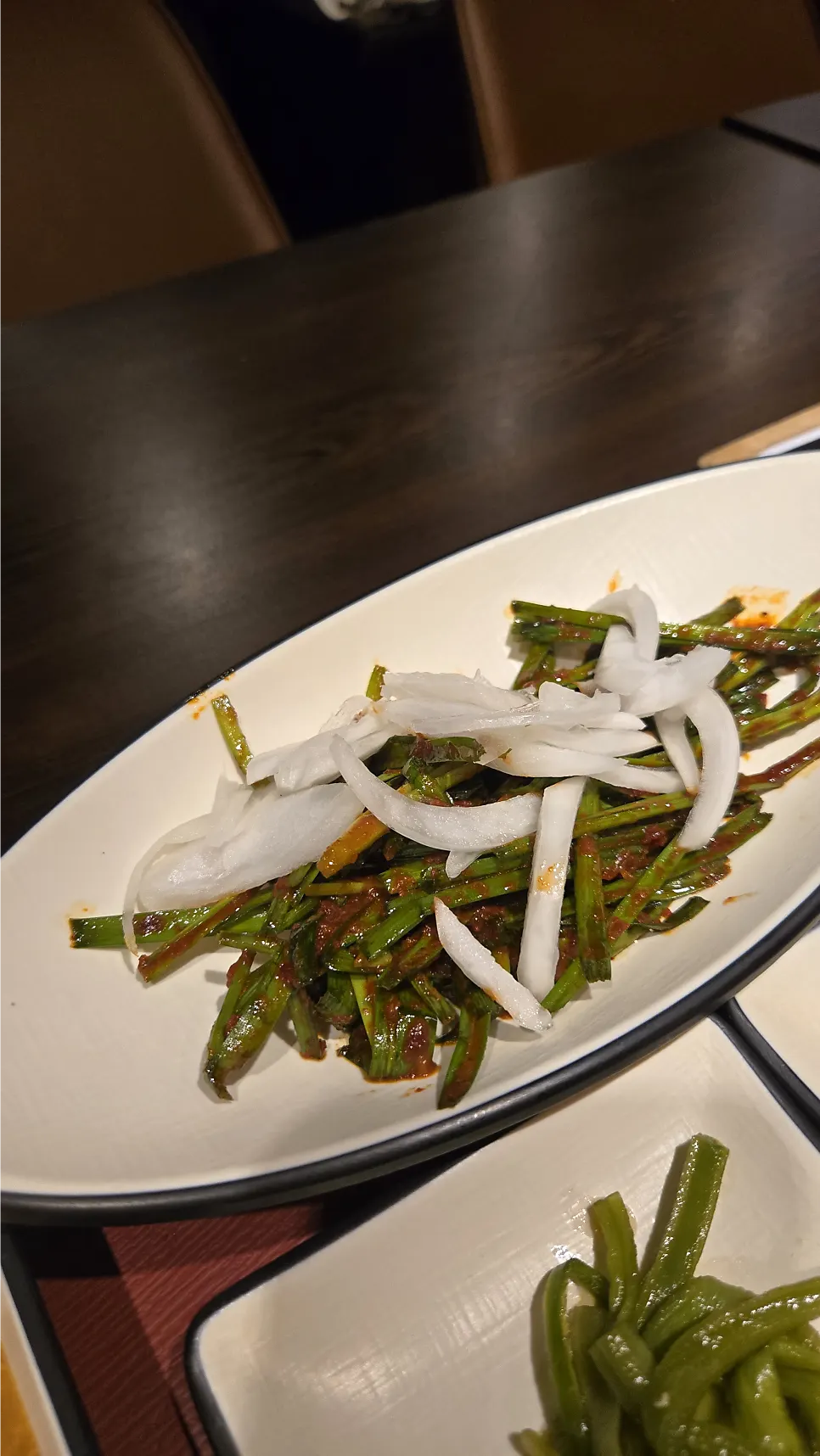 Green onion kimchi and assorted meat side dishes